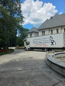 country club moving truck parked outside a house in germantown tennessee
