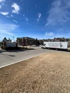 country club moving truck parked outside a senior living community